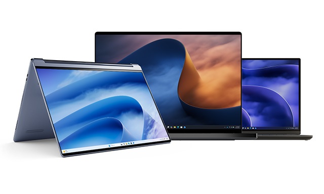 Three laptops are displayed: one is open and angled in a convertible position on the left, another is a larger screen device in the center, and the third is a slim laptop on the right. All have screens showing abstract blue backgrounds.